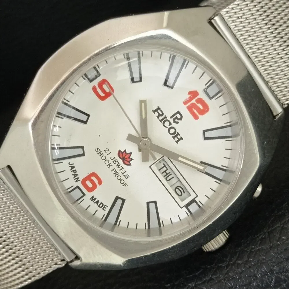 Vintage 1976 Ricoh Automatic Mens Silver Watch W/daydate & Red accents